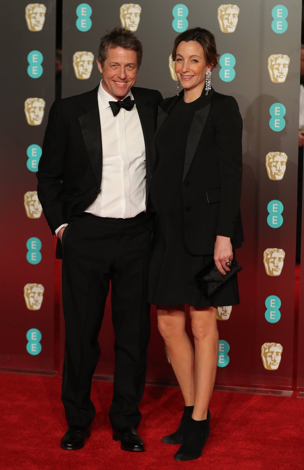 British actor Hugh Grant and Swedish producer Anna Eberstein pose on the red carpet upon arrival at the Baftas at the Royal Albert Hall in London, in February 2018. Photo: AFP Photo British actor Hugh Grant and Swedish producer Anna Eberstein pose on the red carpet upon arrival at the Baftas at the Royal Albert Hall in London, in February 2018. Photo: AFP Photo