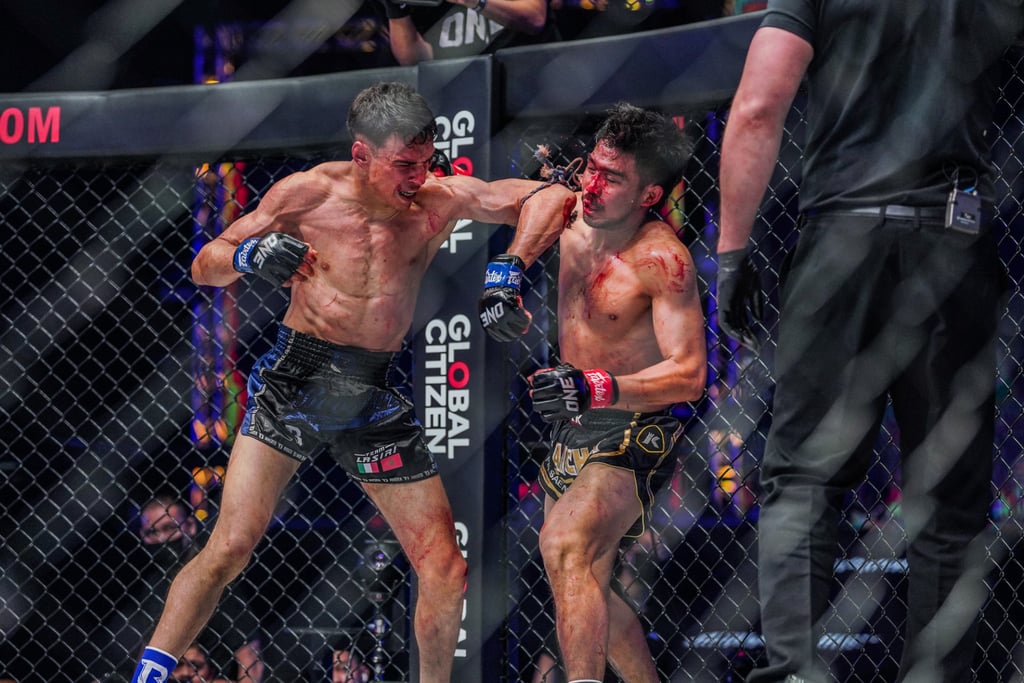 Joseph Lasiri elbows Prajanchai PKSaenchaigym during their strawweight Muay Thai title bout at ONE 157. Photo: ONE Championship Joseph Lasiri elbows Prajanchai PKSaenchaigym during their strawweight Muay Thai title bout at ONE 157. Photo: ONE Championship