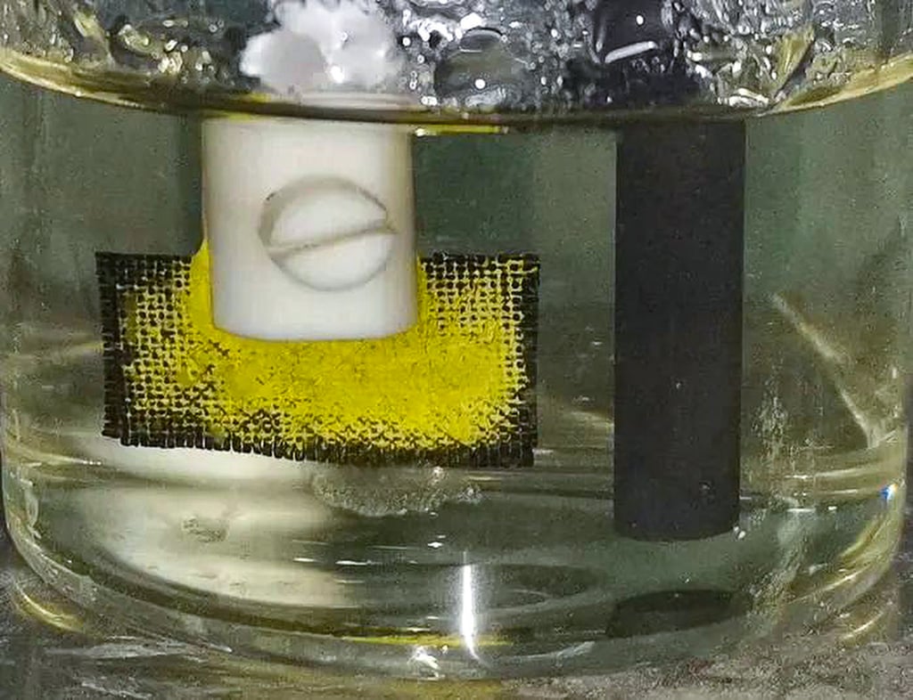 The electrode was created by coating a carbon fibre woven fabric with two monomers that were polymerised to form a material with microscopic bumps and depressions. Photo: Zhu Guangshan The electrode was created by coating a carbon fibre woven fabric with two monomers that were polymerised to form a material with microscopic bumps and depressions. Photo: Zhu Guangshan