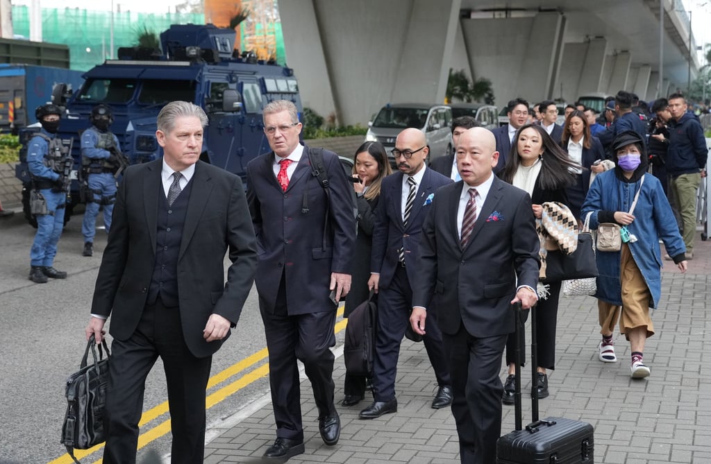 Jimmy Lai’s legal team arrives at court. Lawyers for the 76-year-old had asked judges to strike out a count of conspiracy relating to the tabloid newspaper’s allegedly seditious publications. Photo: Sam Tsang