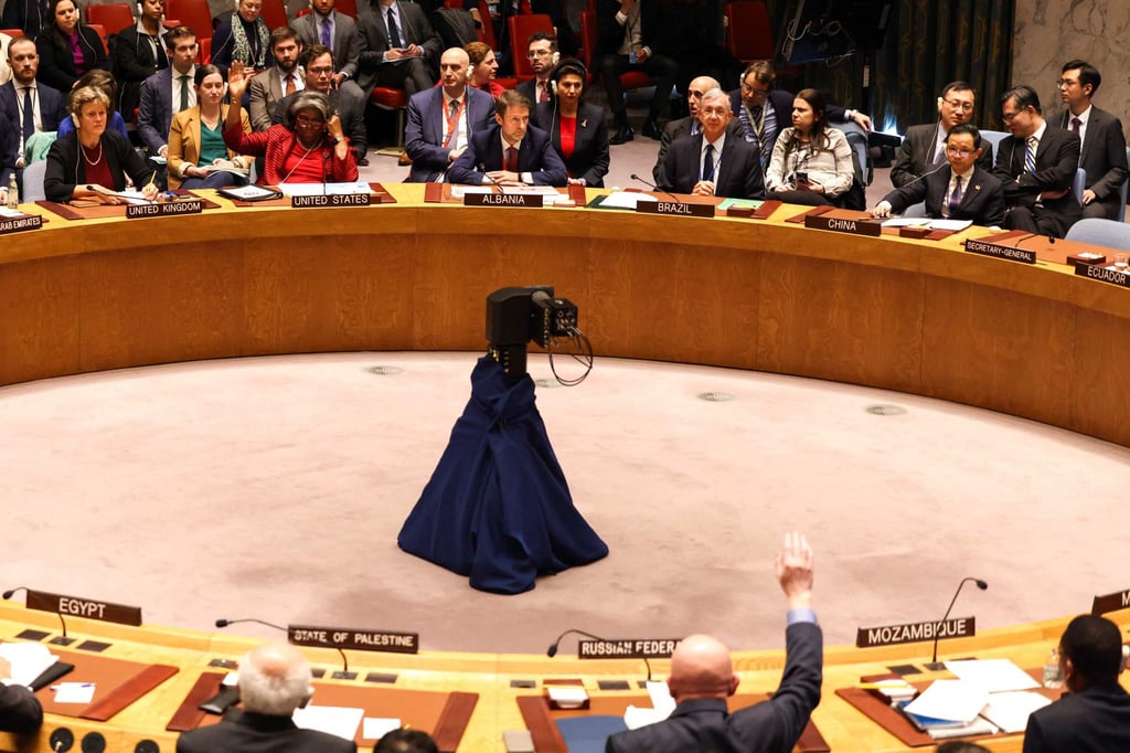 Ambassadors vote during a meeting at UN headquarters in New York on Friday. Photo: AFP Ambassadors vote during a meeting at UN headquarters in New York on Friday. Photo: AFP