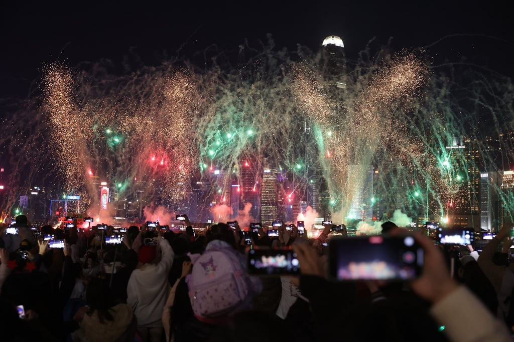 Fireworks at Victoria Harbour. Hundreds began saving spots hours ahead of the 8pm show to grab the best view. Photo: Edmond So Fireworks at Victoria Harbour. Hundreds began saving spots hours ahead of the 8pm show to grab the best view. Photo: Edmond So