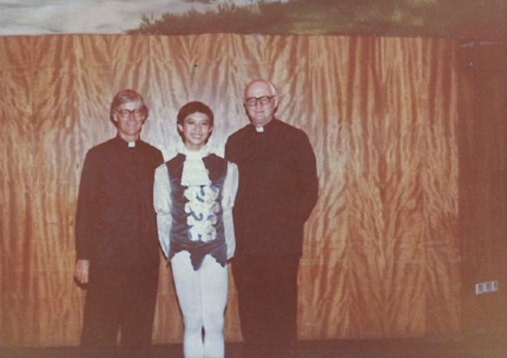 Ng with teachers from Wah Yan College. Photo: Yuri Ng