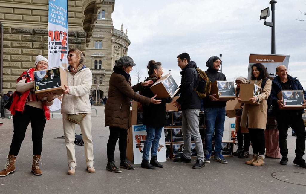 Activists from the Swiss Animal Alliance during the handover of signatures required for a popular initiative to vote on the ban of foie gras imports, in Bern, Switzerland on Thursday. Photo: AFP Activists from the Swiss Animal Alliance during the handover of signatures required for a popular initiative to vote on the ban of foie gras imports, in Bern, Switzerland on Thursday. Photo: AFP