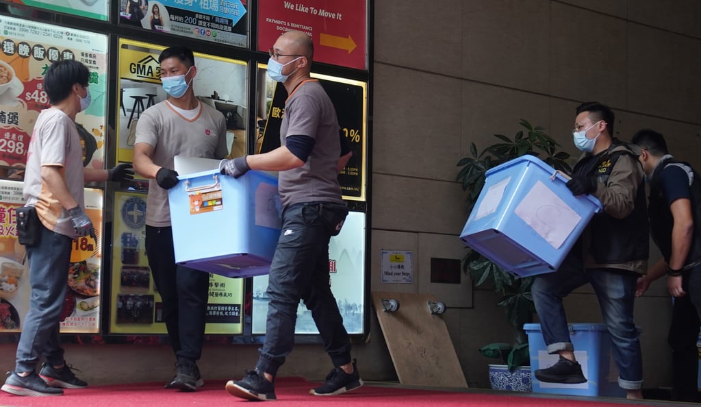 Hong Kong police raid the office of Stand News in 2021. Photo: Sam Tsang