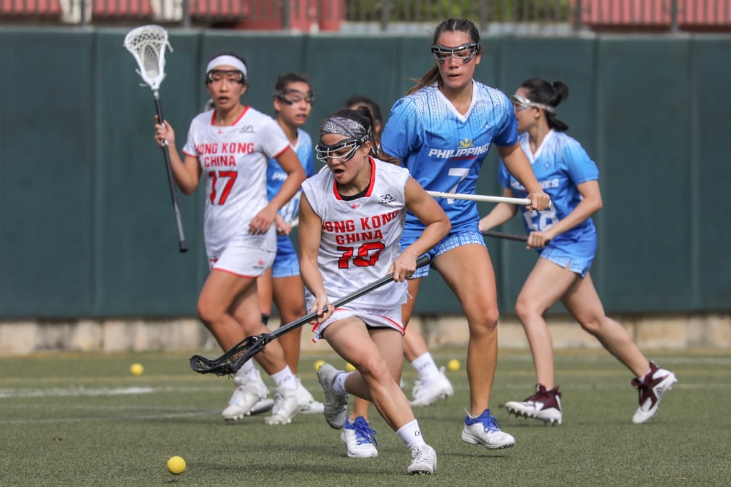 Hong Kong’s Woo Ka-yu runs to gather the ball during the World Lacrosse Super Sixes. Photo: Xiaomei Chen Hong Kong’s Woo Ka-yu runs to gather the ball during the World Lacrosse Super Sixes. Photo: Xiaomei Chen