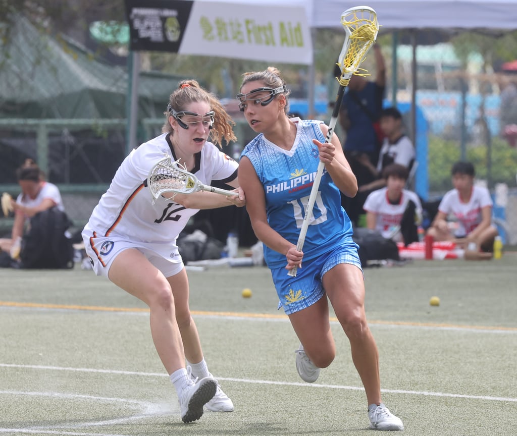 Philippines player Jamie Lastner (right) drives forward during her side’s game against Germany in the World Lacrosse Super Sixes. Photo: Edmond So Philippines player Jamie Lastner (right) drives forward during her side’s game against Germany in the World Lacrosse Super Sixes. Photo: Edmond So