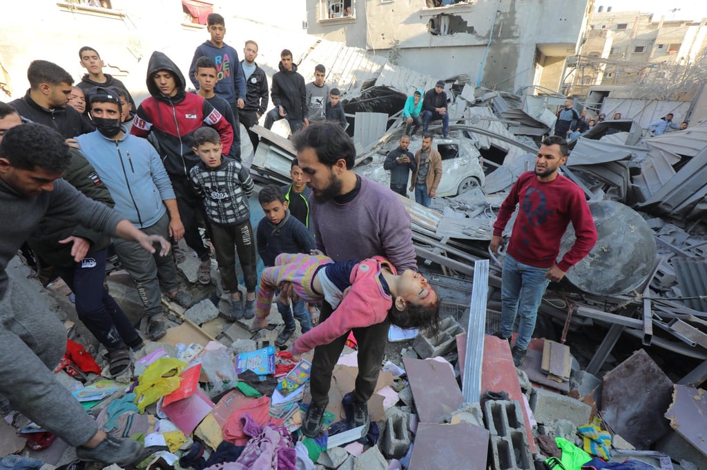 People search for victims between the rubble of a damaged building following an Israeli attack on Nuseirat Camp, Gaza on Saturday. Photo: APA Images via Zuma Press Wire / dpa People search for victims between the rubble of a damaged building following an Israeli attack on Nuseirat Camp, Gaza on Saturday. Photo: APA Images via Zuma Press Wire / dpa
