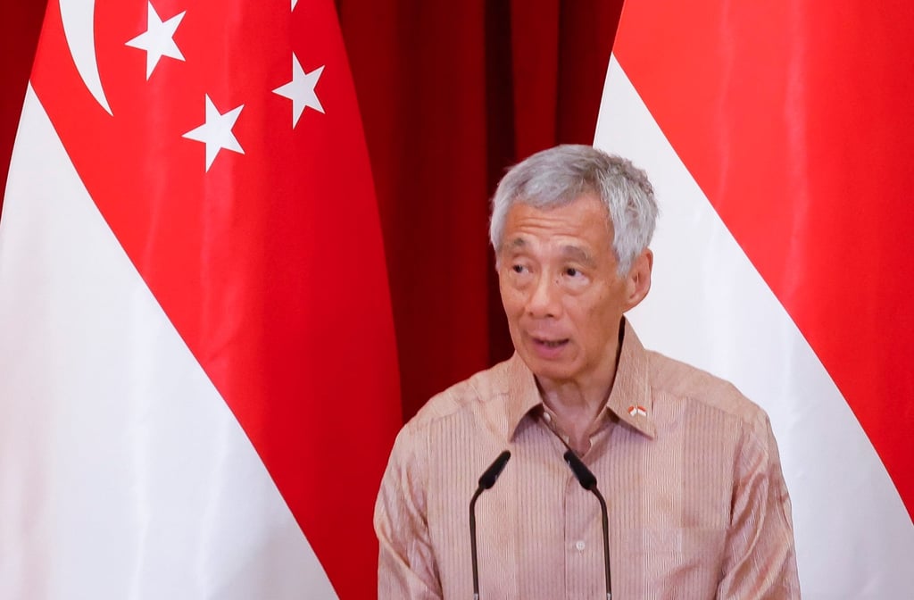 Singapore’s Prime Minister Lee Hsien Loong gives a news conference on March 16. Singapore’s economy has been hurt by softer global demand for its exports, with the return of air travel after the Covid-19 pandemic boosting domestic growth. Photo: EPA-EFE