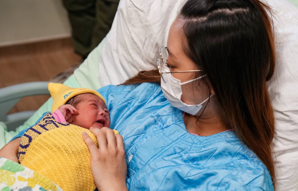 The fourth baby, a girl weighing 2.86kg, was born in Prince of Wales Hospital at 1.36am to the Yip family. Photo: Elson Li The fourth baby, a girl weighing 2.86kg, was born in Prince of Wales Hospital at 1.36am to the Yip family. Photo: Elson Li