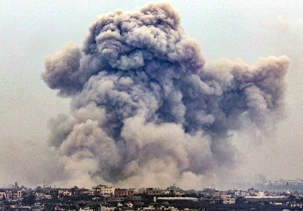 Smoke billows over Khan Yunis from Rafah in the southern Gaza strip during Israeli bombardment on Tuesday. Photo: AFP
