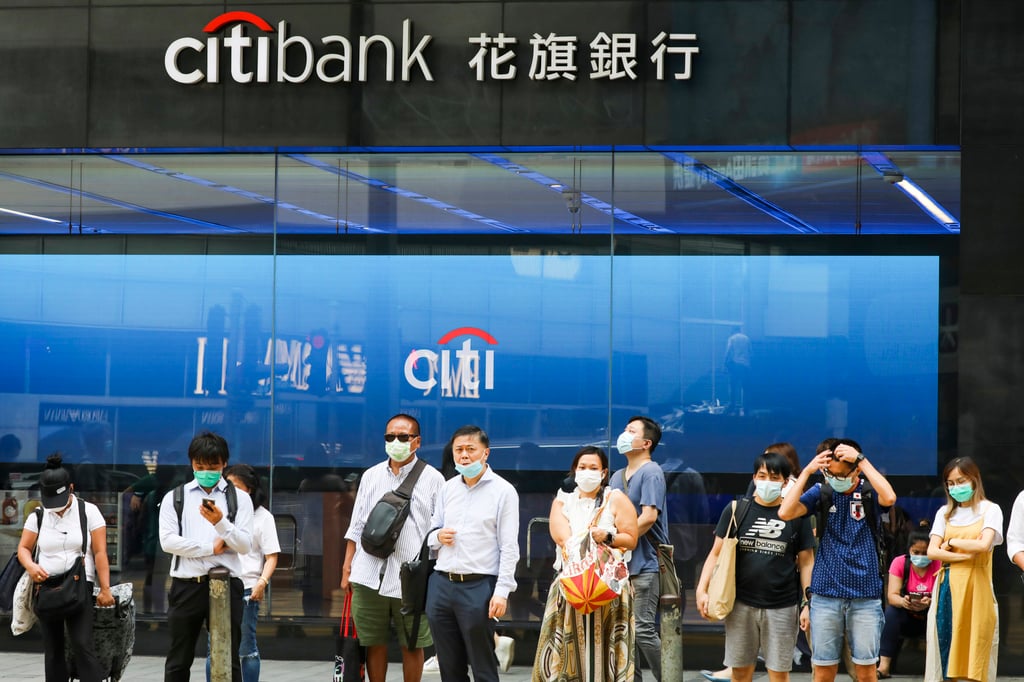 People stand near a Citibank branch in Central, Hong Kong, on July 20, 2020. Photo: Nora Tam