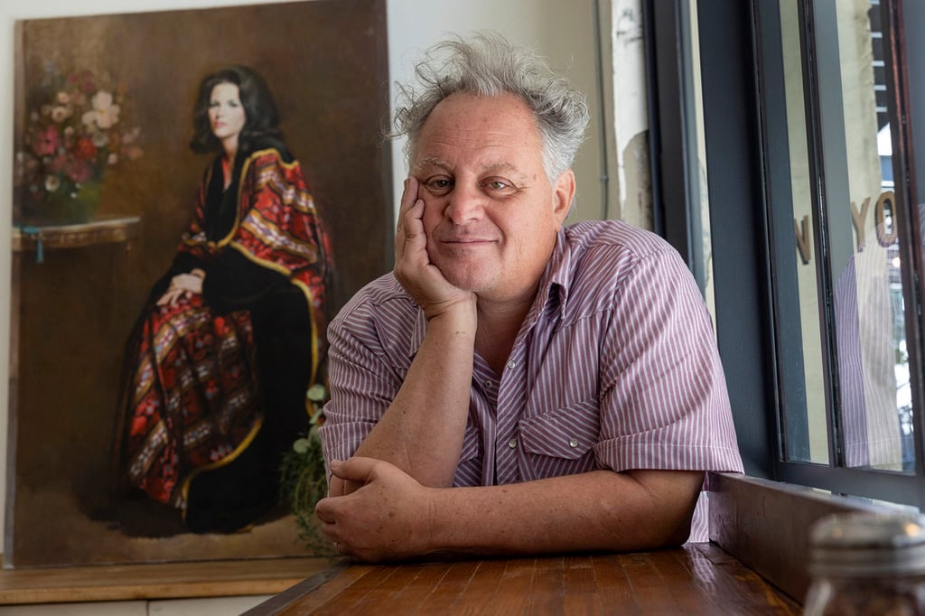 Chef Chris Bianco, with the 1970 painting by his father, Leonard. Photo: TNS