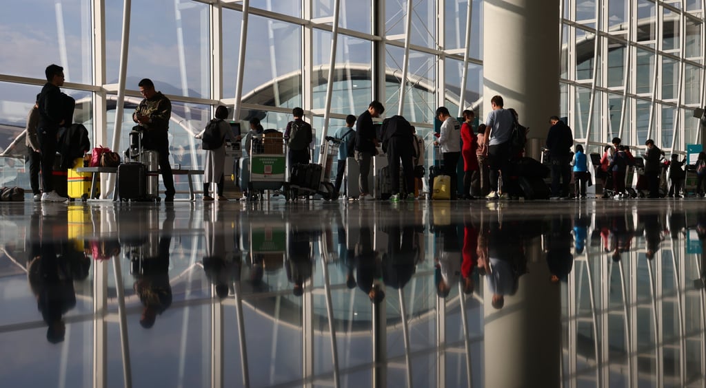 Travellers pass through Hong Kong International Airport on December 30, 2023. Photo: Dickson Lee Travellers pass through Hong Kong International Airport on December 30, 2023. Photo: Dickson Lee