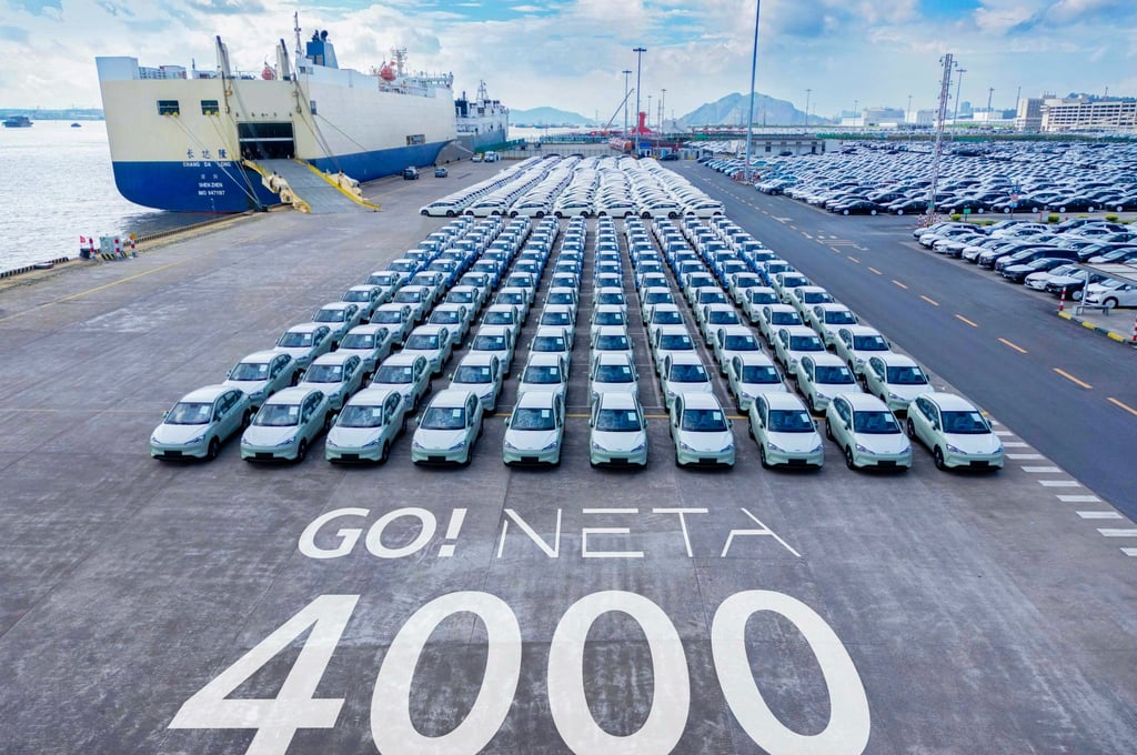 Hozon New Energy Automobile EVs await shipment overseas from Shanghai. Photo: Weibo Hozon New Energy Automobile EVs await shipment overseas from Shanghai. Photo: Weibo