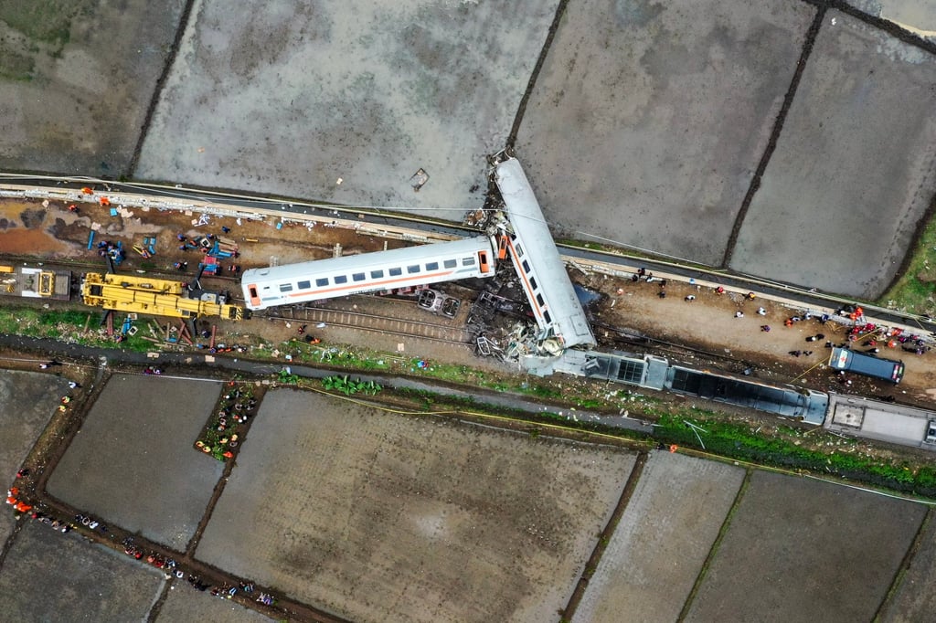 An aerial photo taken with a drone shows the wreckage of the collided passenger trains in Bandung. Photo: EPA-EFE An aerial photo taken with a drone shows the wreckage of the collided passenger trains in Bandung. Photo: EPA-EFE