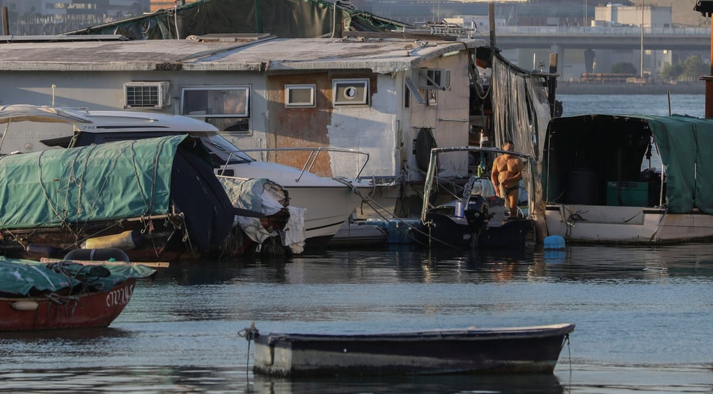 A man washes himself at the Causeway Bay Typhoon Shelter. Photo: Antony Dickson A man washes himself at the Causeway Bay Typhoon Shelter. Photo: Antony Dickson