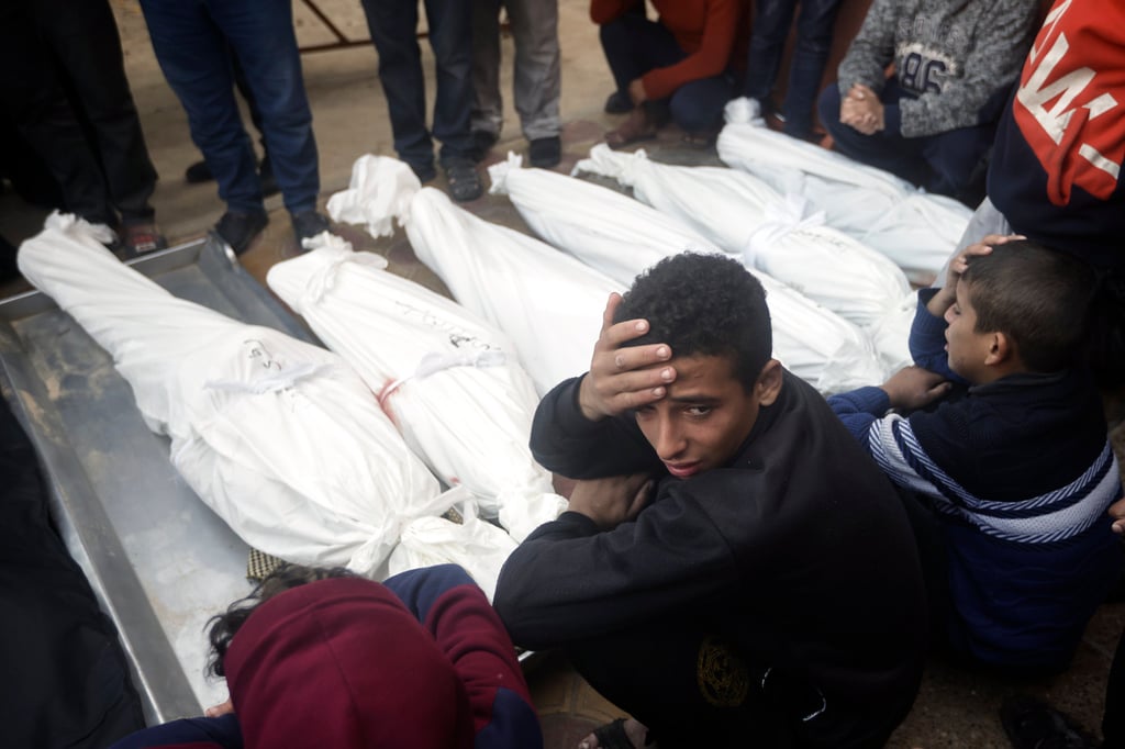 Palestinians mourn relatives killed in an Israeli strike in Khan Younis, Gaza on Thursday. Photo: AP