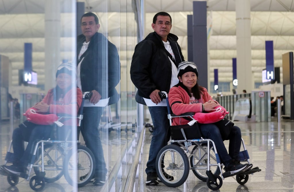 Norma Del Mundo Favorito and her husband, Raul Martinez Favorito, prepare to fly out from Hong Kong. Photo: Xiaomei Chen Norma Del Mundo Favorito and her husband, Raul Martinez Favorito, prepare to fly out from Hong Kong. Photo: Xiaomei Chen