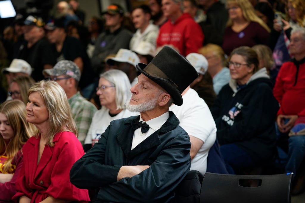 People listen as Republican presidential candidate Donald Trump speaks at a rally at Des Moines Area Community College in Newton, Iowa, on Saturday. Photo: AP People listen as Republican presidential candidate Donald Trump speaks at a rally at Des Moines Area Community College in Newton, Iowa, on Saturday. Photo: AP