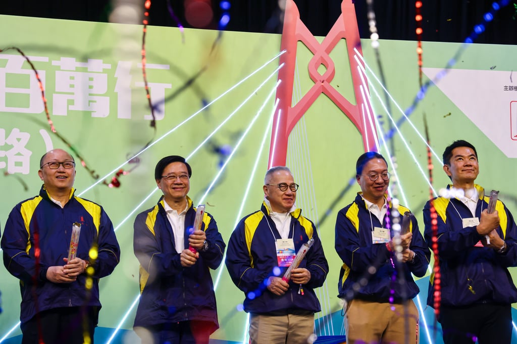 Liaison office chief Zheng Yanxiong (left) stands beside Hong Kong Chief Executive John Lee at the opening ceremony. Photo: Dickson Lee