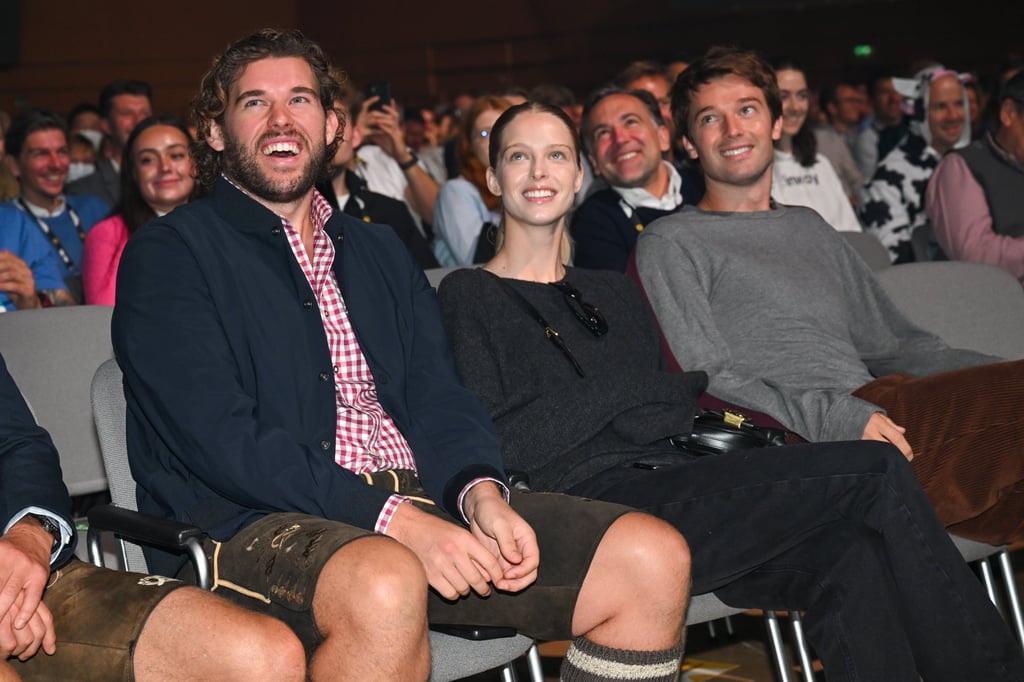 Christopher Schwarzenegger (L) sits with model Abby Champion and her partner, Chris’ brother Patrick Schwarzenegger in 2022 in Munich, Germany. Photo: Getty Images