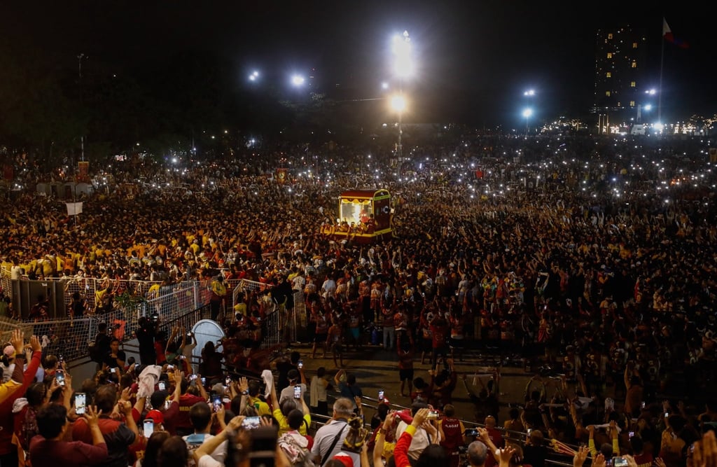 Catholics flock to the early-morning procession marking the feast day of the Black Nazarene at the Quirino Grandstand park in Manila on Tuesday. Photo: EPA-EFE Catholics flock to the early-morning procession marking the feast day of the Black Nazarene at the Quirino Grandstand park in Manila on Tuesday. Photo: EPA-EFE