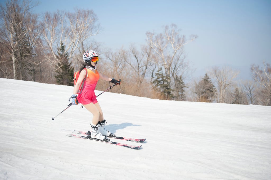 A woman wearing a swimsuit skis during the Naked Pig Skiing Carnival at the Yabuli Ski Resort in Harbin, Heilongjiang province, northeast China. Photo: Getty Images