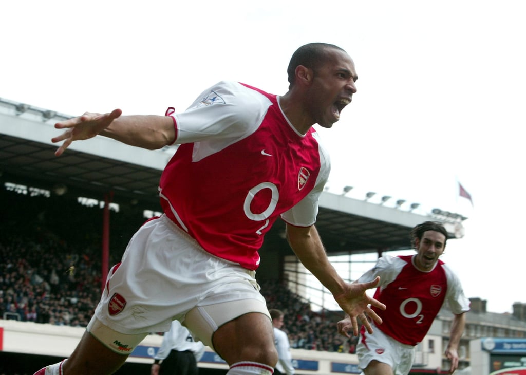Arsenal striker Thierry Henry celebrates after scoring in a 4-2 Premier League win against Liverpool at Highbury, on April 9, 2004. Photo: Reuters