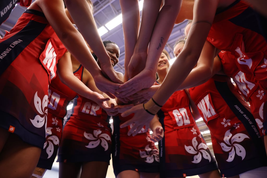 Hong Kong players say their final words before the women’s final against Papua New Guinea. Photo: Yik Yeung-man Hong Kong players say their final words before the women’s final against Papua New Guinea. Photo: Yik Yeung-man