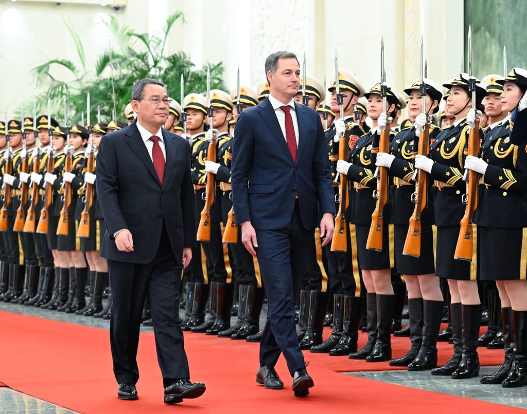 Chinese Premier Li Qiang escorts De Croo in a welcoming ceremony in the Great Hall of the People prior to their talks on Friday. Photo: Xinhua Chinese Premier Li Qiang escorts De Croo in a welcoming ceremony in the Great Hall of the People prior to their talks on Friday. Photo: Xinhua