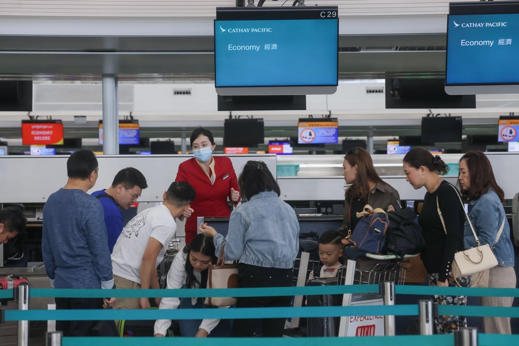 Cathay Pacific customers check in at the airport. The carrier’s CEO has said the company will set up a working group to investigate the recent wave of flight cancellations. Photo: Jonathan Wong Cathay Pacific customers check in at the airport. The carrier’s CEO has said the company will set up a working group to investigate the recent wave of flight cancellations. Photo: Jonathan Wong