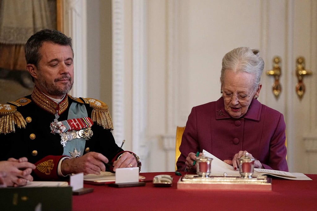 Queen Margrethe II of Denmark signs a declaration of abdication as Crown Prince Frederik of Denmark becomes King Frederik X of Denmark in the Council of State at the Christiansborg Castle in Copenhagen on January 14. Photo: AFP Queen Margrethe II of Denmark signs a declaration of abdication as Crown Prince Frederik of Denmark becomes King Frederik X of Denmark in the Council of State at the Christiansborg Castle in Copenhagen on January 14. Photo: AFP