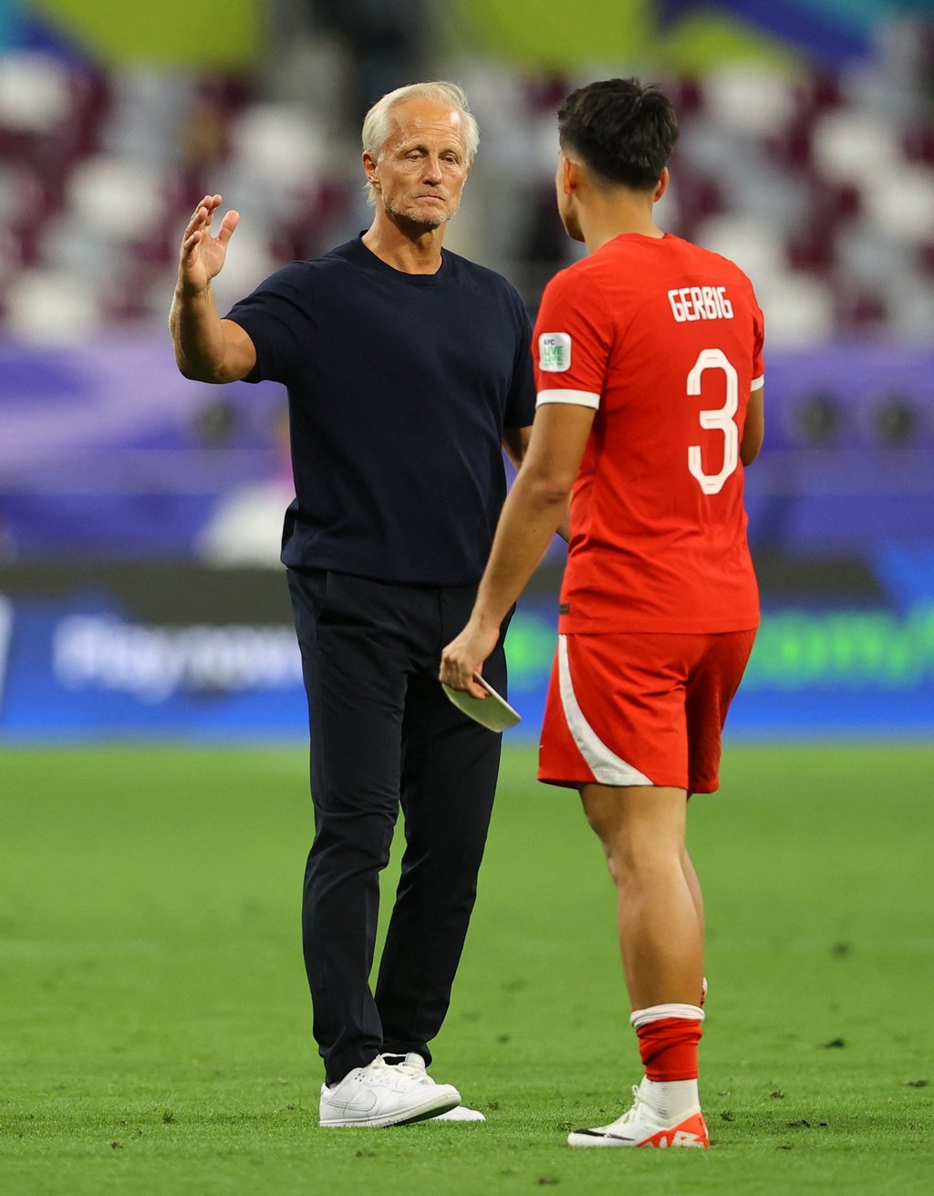 Jorn Andersen consoles Oliver Gerbig after the player’s fine display was marred by a harsh penalty call. Photo: Reuters Jorn Andersen consoles Oliver Gerbig after the player’s fine display was marred by a harsh penalty call. Photo: Reuters