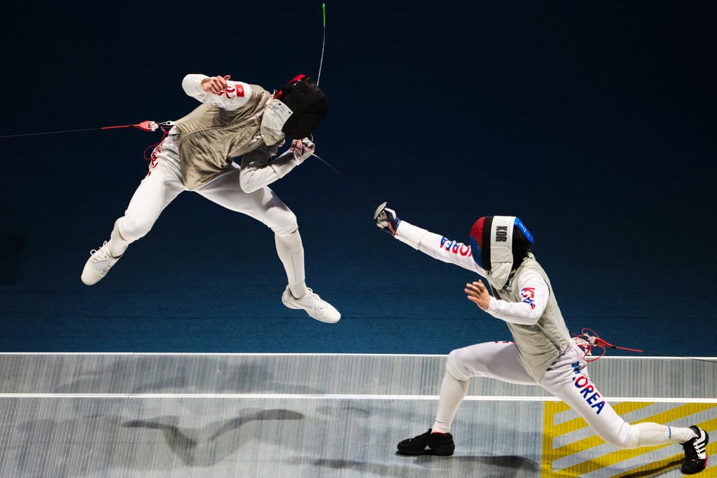 Cheung Ka-long (left) won individual gold in Tokyo but his Hong Kong teammates also qualified. Photo: SF&OC