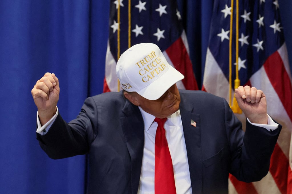 Donald Trump dances as he campaigns in Indianola, Iowa. Photo: Reuters
