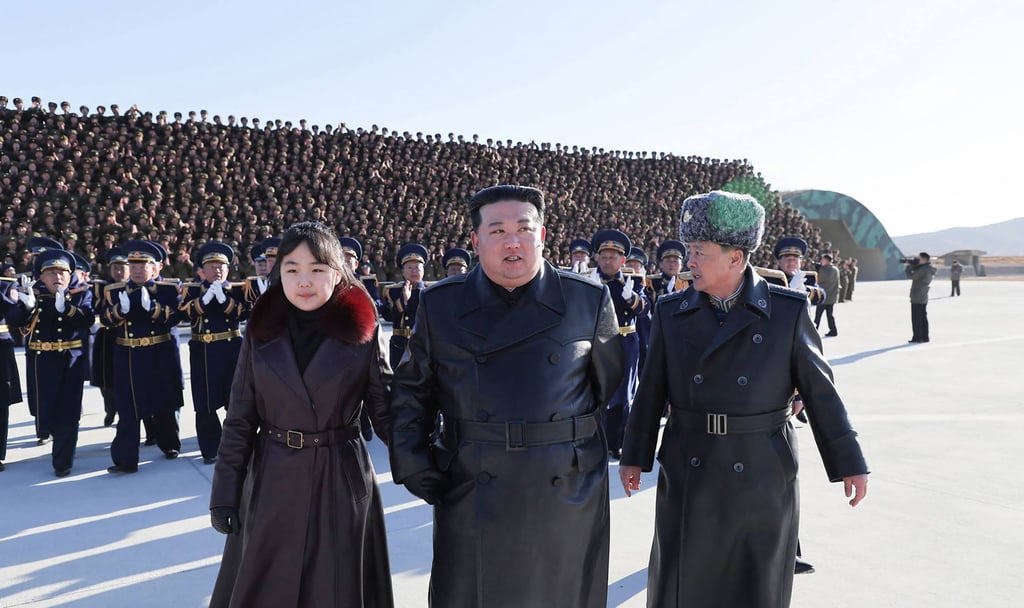 Kim Jong-un and his daughter Kim Ju-ae visit the Korean People’s Army 1st Air Force Division Flying Regiment to commemorate Air Day, last November. Photo: AFP Photo/KCNA via KNS Kim Jong-un and his daughter Kim Ju-ae visit the Korean People’s Army 1st Air Force Division Flying Regiment to commemorate Air Day, last November. Photo: AFP Photo/KCNA via KNS