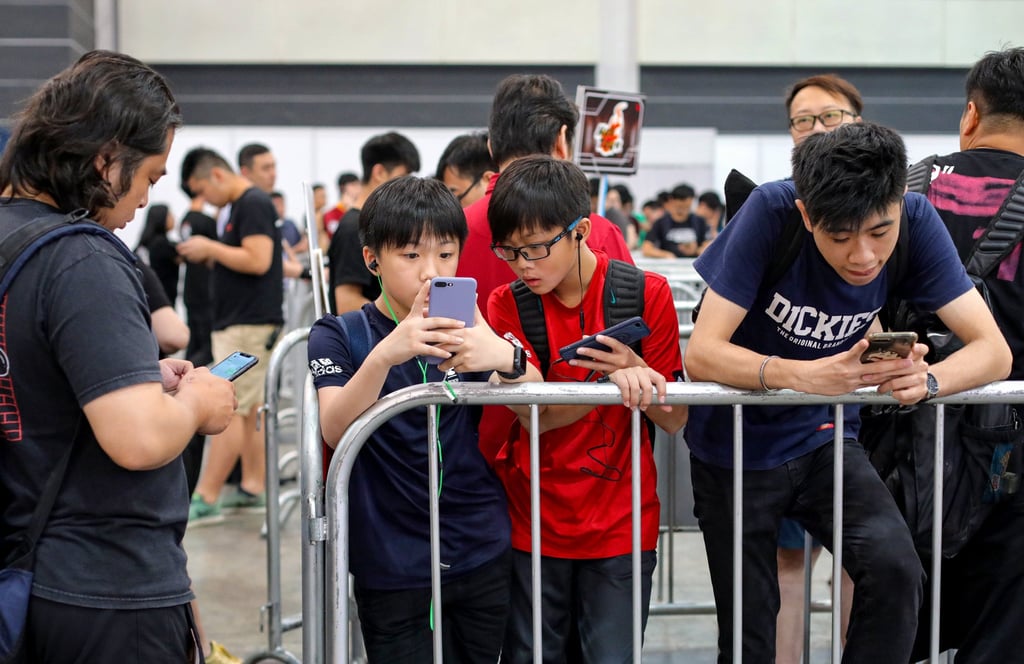 Visitors to a comics and games expo in Hong Kong. Current legislation is inadequate in preventing underage people from participating in online gaming similar to gambling, the Consumer Council said. Photo: May Tse Visitors to a comics and games expo in Hong Kong. Current legislation is inadequate in preventing underage people from participating in online gaming similar to gambling, the Consumer Council said. Photo: May Tse