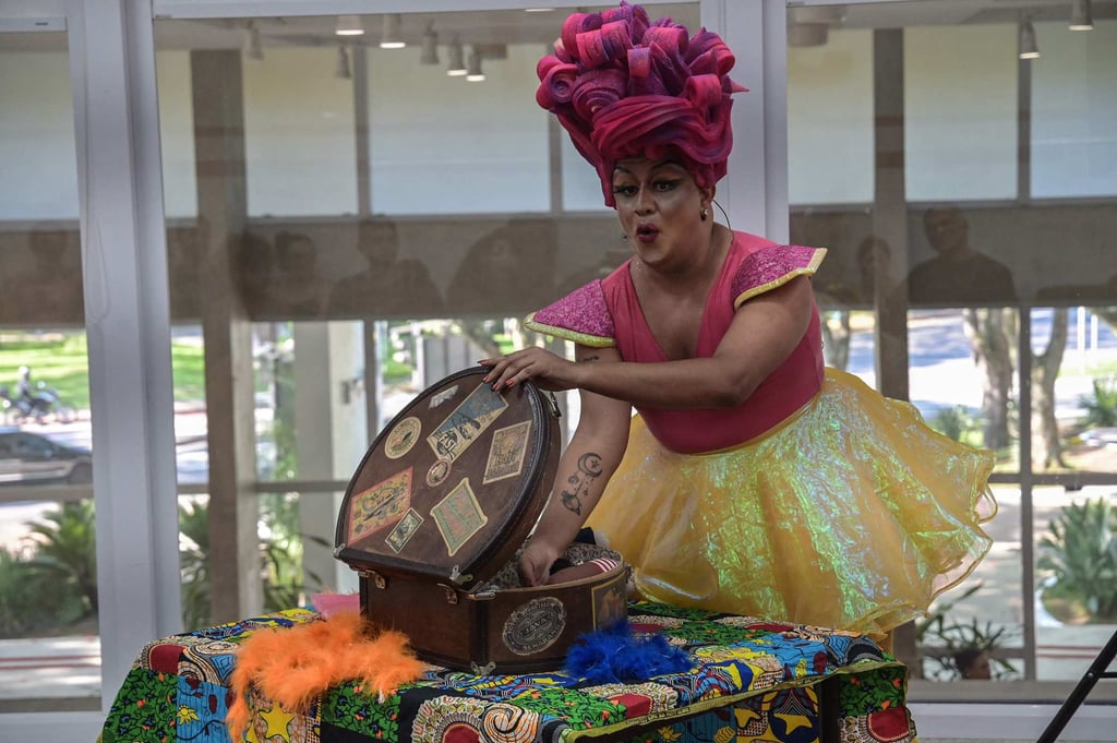 Brazilian drag queen Paulo Reis, known as Helena Black, uses dolls and voices to perform the story, adapted from a children’s book by Brazilian author Janaina Leslao. Photo: AFP