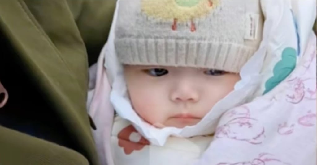 The baby girl was found abandoned on the street with a note attached to her explaining that her birth parents could not afford to raise her. Photo: Douyin
