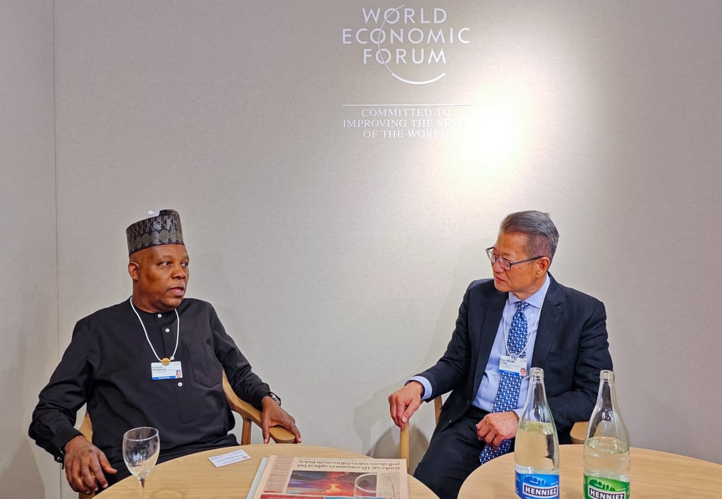 Hong Kong finance chief Paul Chan (right) meets Nigerian Vice-President Kashim Shettima during the World Economic Forum annual meeting in Switzerland. Photo: ISD Hong Kong finance chief Paul Chan (right) meets Nigerian Vice-President Kashim Shettima during the World Economic Forum annual meeting in Switzerland. Photo: ISD
