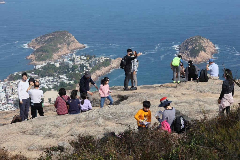 Hikers enjoy the sunny weather on the Dragon’s Back trail in Shek O. Photo: Dickson Lee Hikers enjoy the sunny weather on the Dragon’s Back trail in Shek O. Photo: Dickson Lee