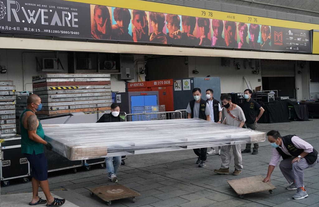 Police officers collect evidence from the Hong Kong Coliseum in August 2022. Photo: Felix Wong Police officers collect evidence from the Hong Kong Coliseum in August 2022. Photo: Felix Wong