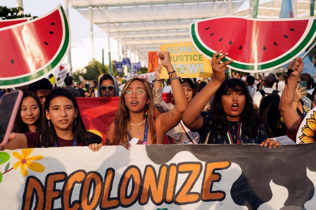 Activists demonstrate for climate justice and a ceasefire in the Gaza war at the recent Cop28 climate summit in Dubai. Photo: AP