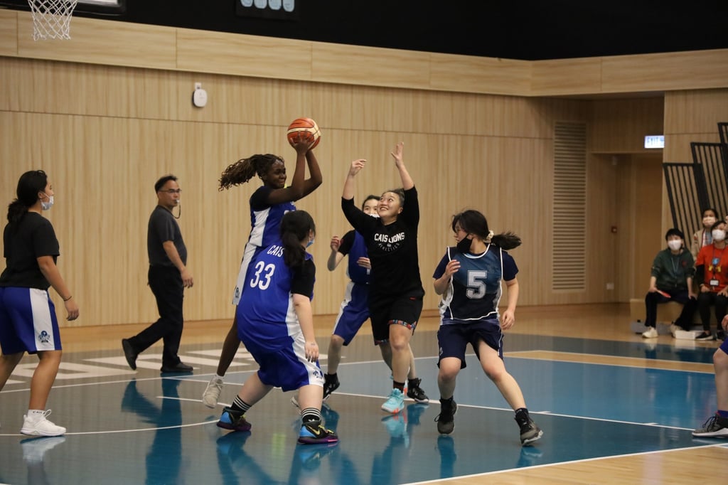 CAISâ modern facilities include two gymnasiums â both with full-sized basketball courts â with one also featuring a rock-climbing wall with an auto-belay system. CAISâ modern facilities include two gymnasiums â both with full-sized basketball courts â with one also featuring a rock-climbing wall with an auto-belay system.