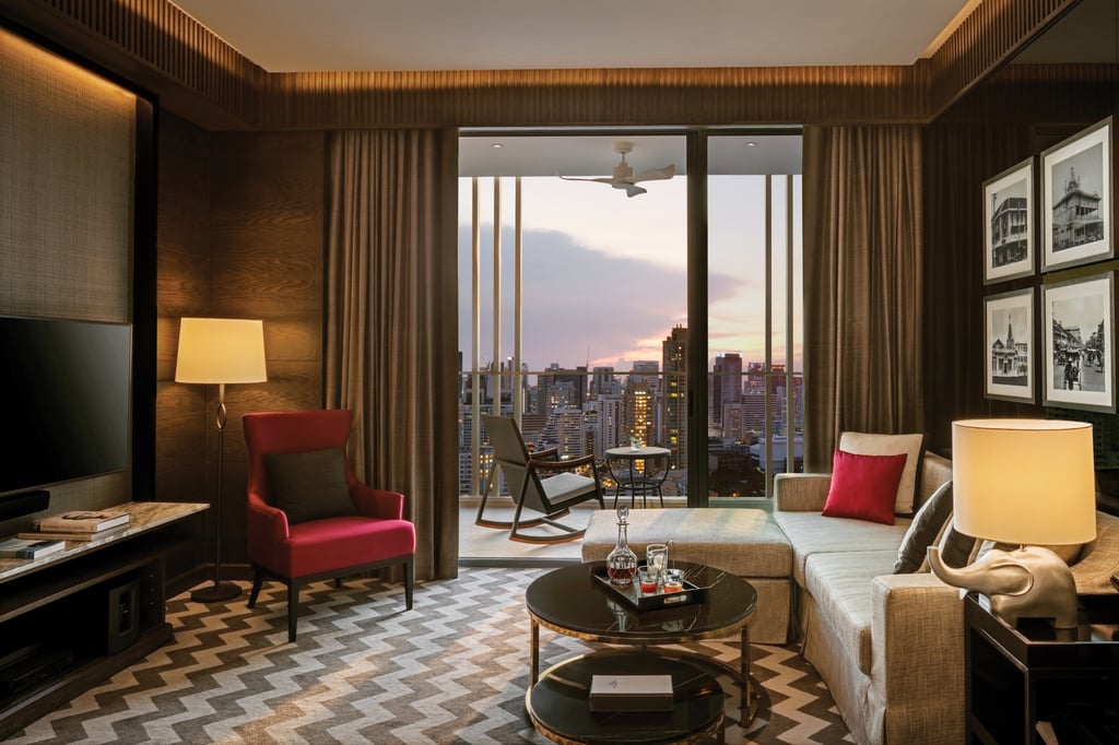 A cosy living room in a suite at 137 Pillars Suites & Residences Bangkok, with a balcony that overlooks the residential Phrom Phong neighbourhood A cosy living room in a suite at 137 Pillars Suites & Residences Bangkok, with a balcony that overlooks the residential Phrom Phong neighbourhood