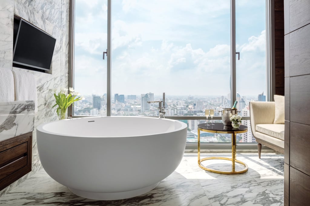 The bathroom of the Sukhotai Suite at 137 Pillars Suites & Residences Bangkok features a free-standing bathtub. Photos: 137 Pillars Suites & Residences The bathroom of the Sukhotai Suite at 137 Pillars Suites & Residences Bangkok features a free-standing bathtub. Photos: 137 Pillars Suites & Residences