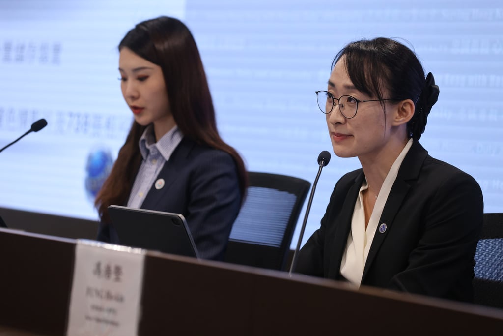 (From left) Senior Inspector Sarah Chan and acting superintendent Bonne Ngan anounce the arrest of eight men and a teenage boy in connection with a child porn investigation. Photo: May Tse
