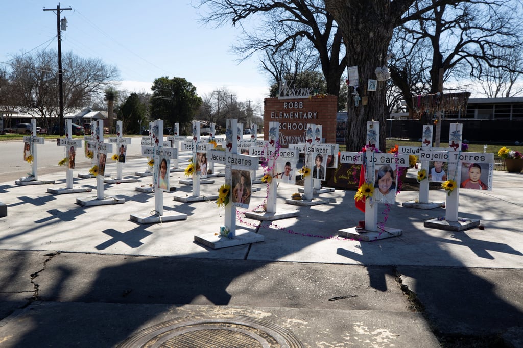 Memorial crosses in front of Robb Elementary School in Uvalde, Texas. Photo: Reuters