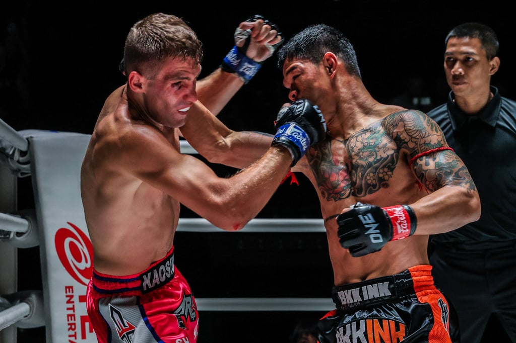 Kongthoranee Sor Sommai punches Sharif Mazoriev during their fight at ONE Friday Fights 48. Photo: ONE Championship